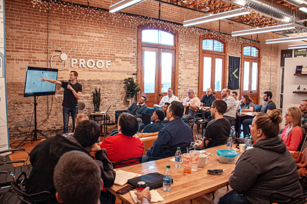 Casual audience listening to a speaker in a workshop