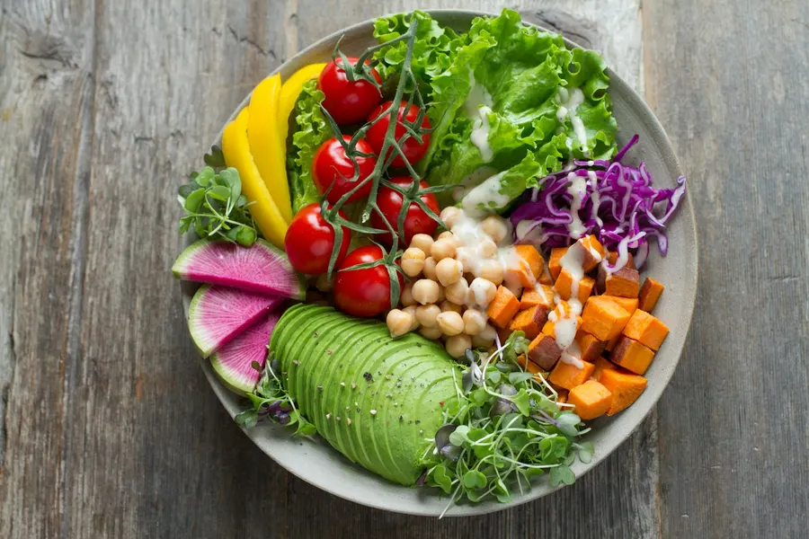 Colourful balanced meal bowl with fresh vegetables