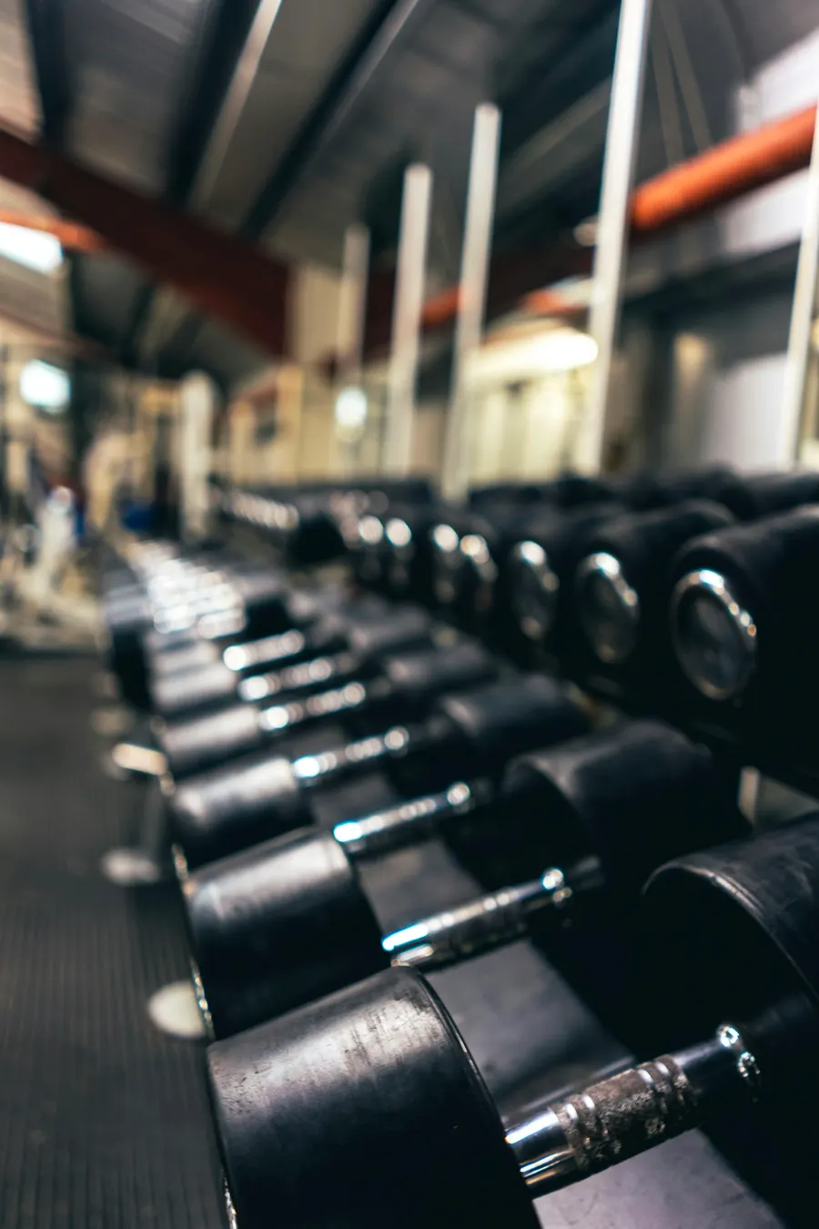 Weight rack with dumbbells in a gym